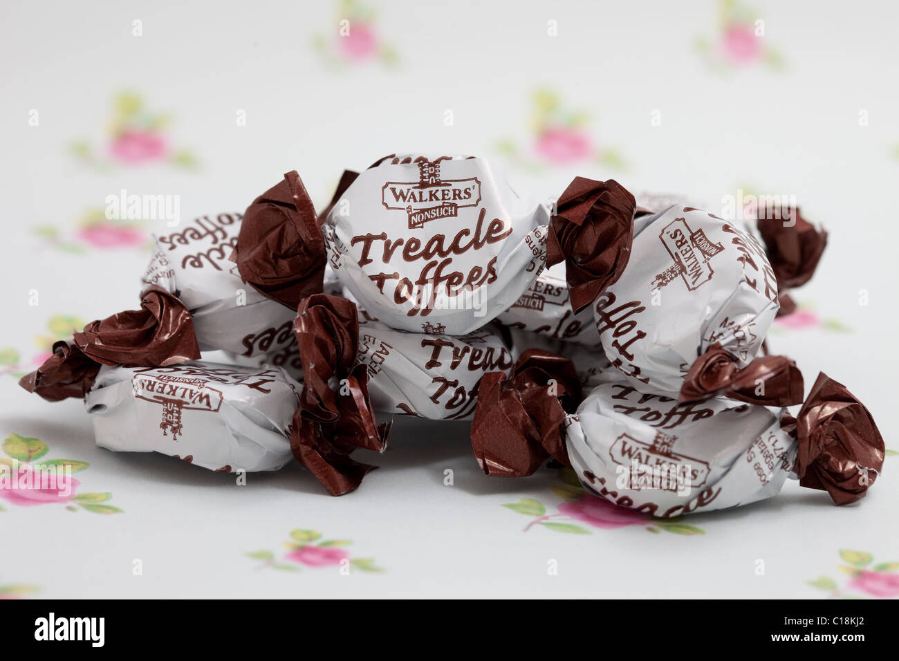 treacle toffee sweets and candy on a paper background photographed in a studio Stock Photo