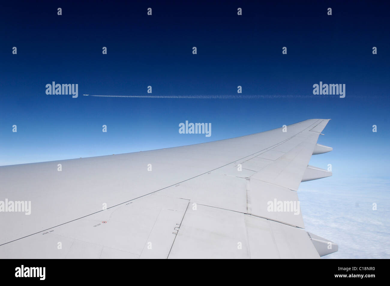 Wing of an aeroplane and plane, 10.000 m high, Atlantic flight from Europe to New York, USA Stock Photo