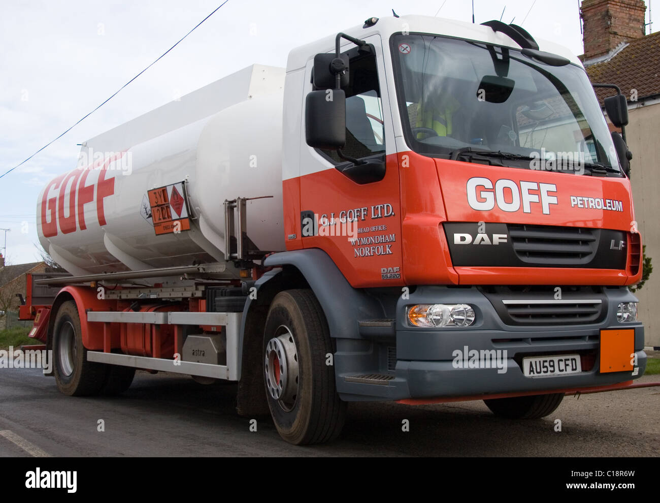Oil/Fuel tanker truck making a delivery of heating oil (Kerosene) Stock Photo