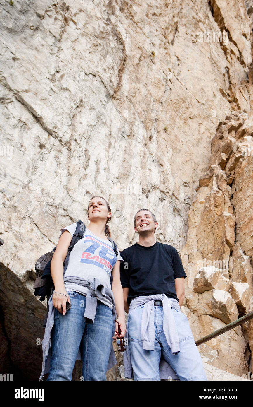 Man and woman on mountain excursion Stock Photo