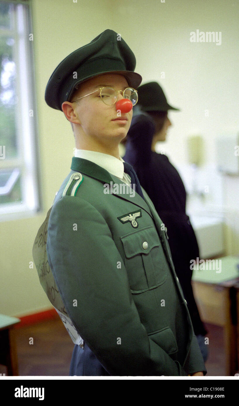 School students dressed up for the first Comic Relief Red Nose day 5 February 1988. Boy dressed as Nazi German officer. Stock Photo