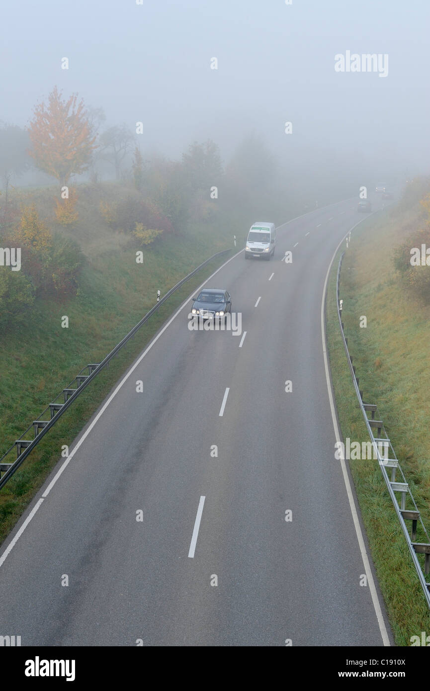 Foggy road hi-res stock photography and images - Alamy