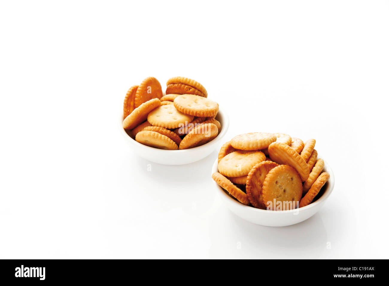 Salted cookies in white bowls Stock Photo