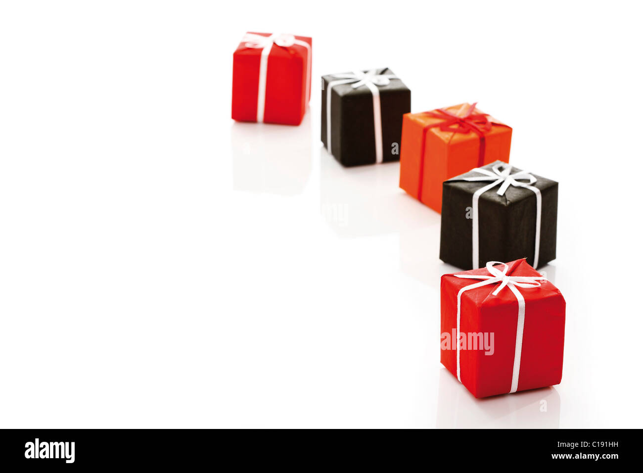 Slanted row of gift parcels, presents Stock Photo