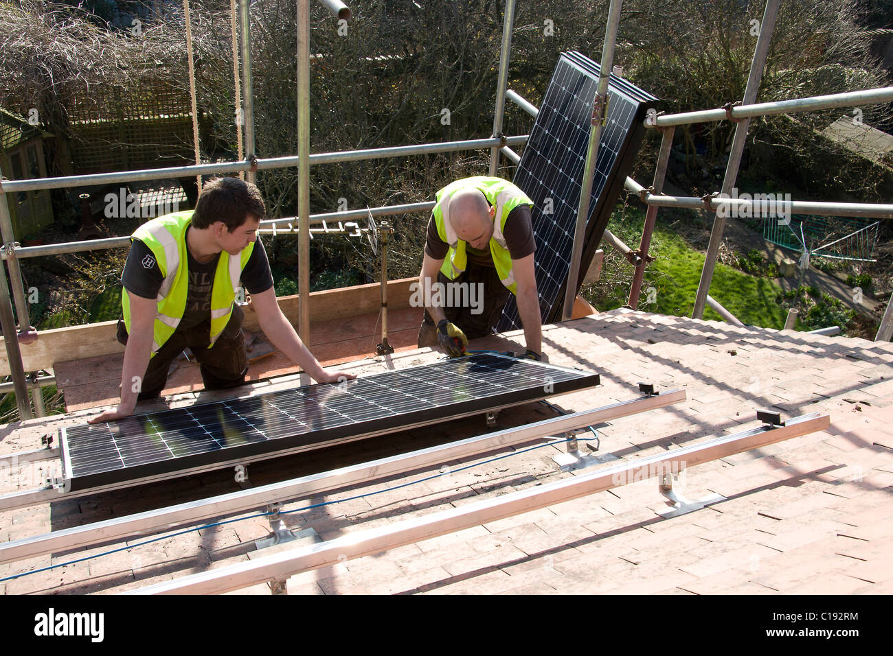 Installation Of Pv Photovoltaic Solar Panels On A Pitched Roof Stock 