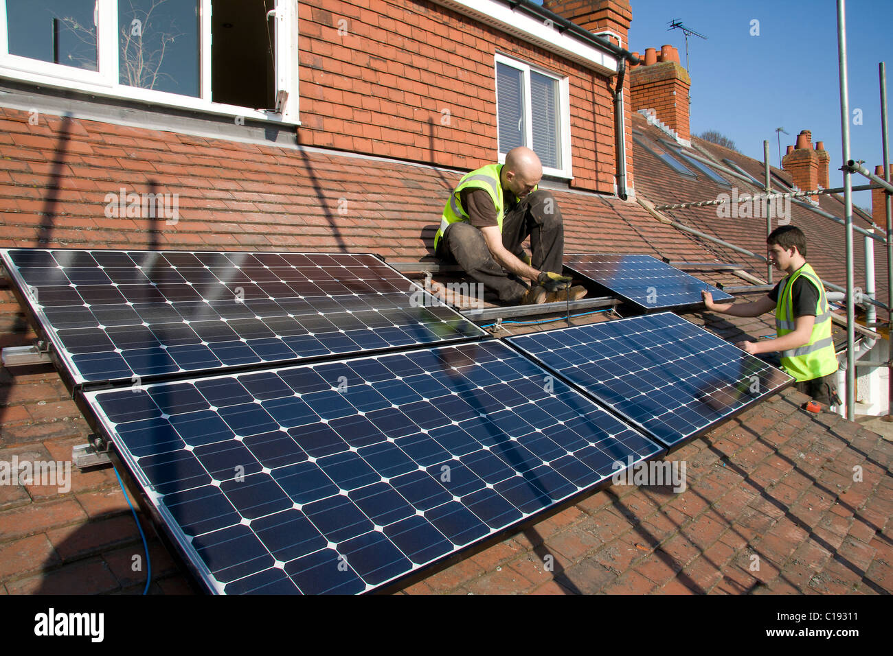 Installation Of Pv Photovoltaic Solar Panels On A Pitched Roof Stock 