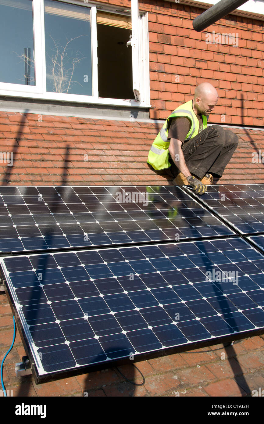 Installation Of Pv Photovoltaic Solar Panels On A Pitched Roof Stock 