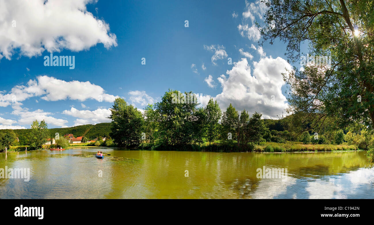 Landscape photo of the Altmuehl River near the Hammermuehle or hammer mill near Solnhofen in the Altmuehltal Nature Park Stock Photo