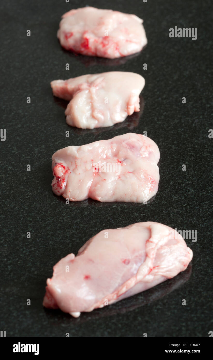 Raw Sweetbreads  -  An example of the strange or weird food eaten by people around the world Stock Photo