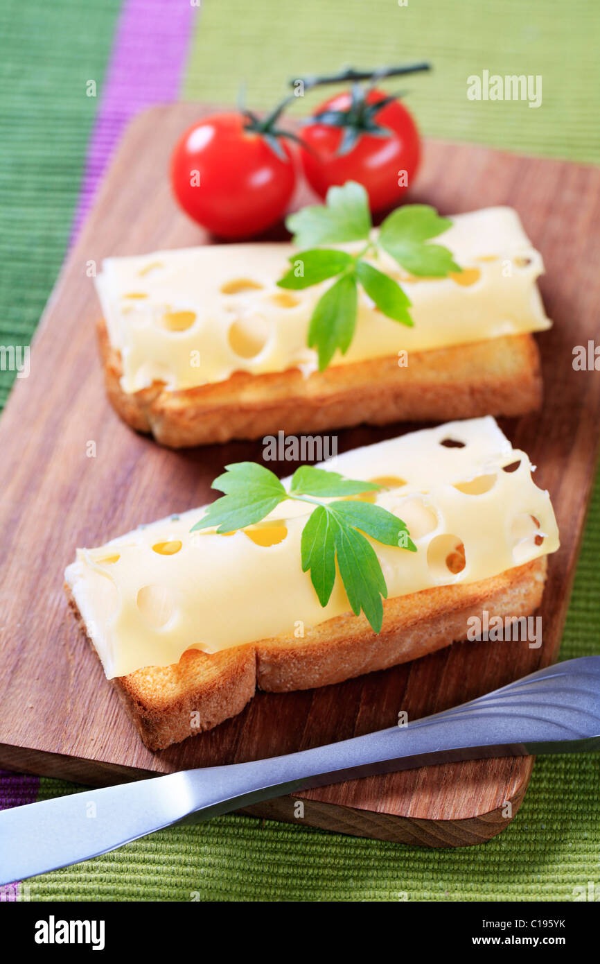Thin slices of Emmentaler cheese on toast Stock Photo Alamy