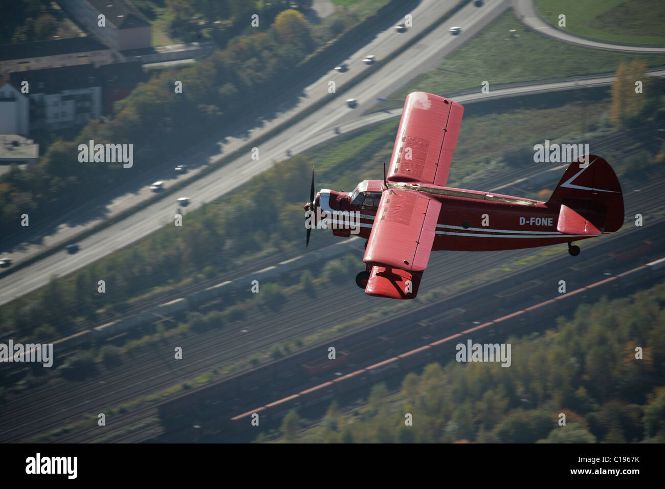 Aerial photograph, motorway, red double decker aircraft, oldtimer, veteran airplane, historical airplane, Antonow double decker Stock Photo