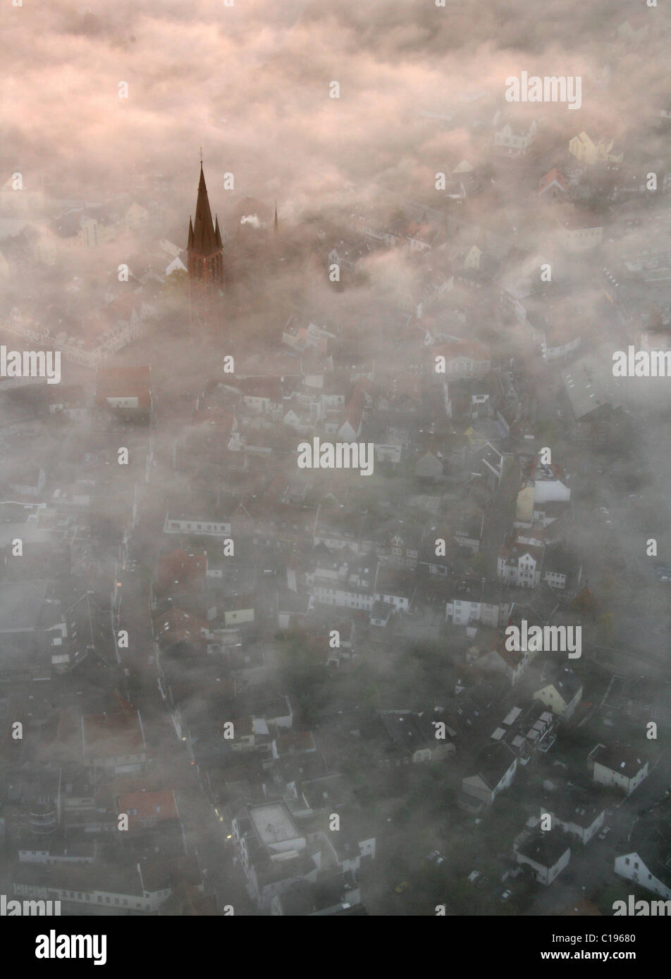 Aerial picture, layer of fog, fog, cloud of fog, autumn, spire of St. Sixtus, Halterner Stausee lake, Haltern, Muensterland Stock Photo