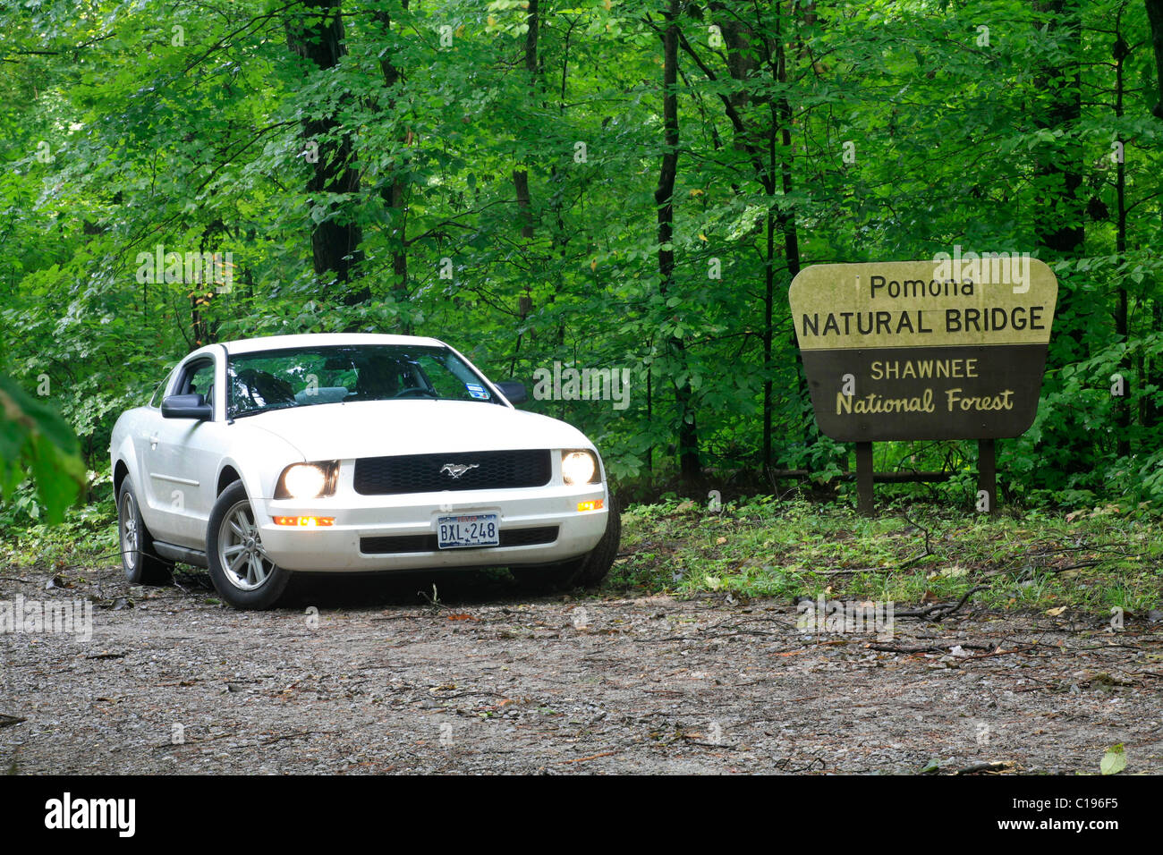 Rental car at the entrance to the Pomona Natural Bridge in the Shawnee