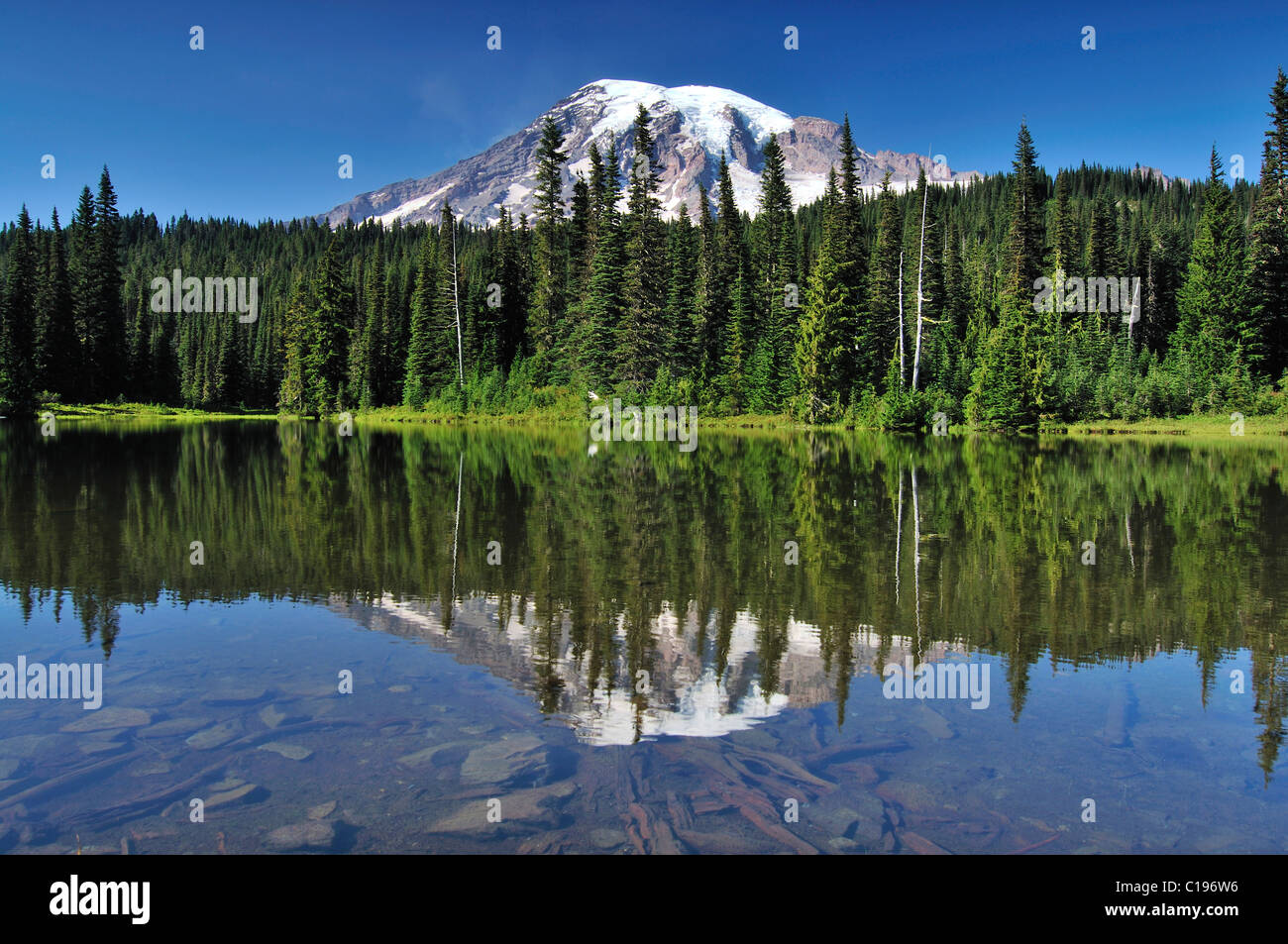 Mount Rainier mirroring itself in Reflection Lake, Mt. Rainier National Park, Washington, USA Stock Photo