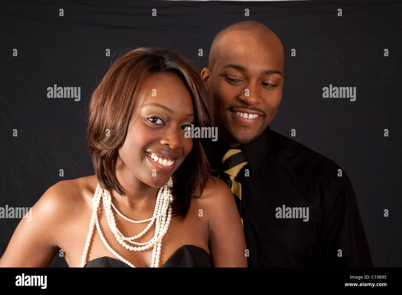 African American couple smiling and enjoying each other's company Stock ...