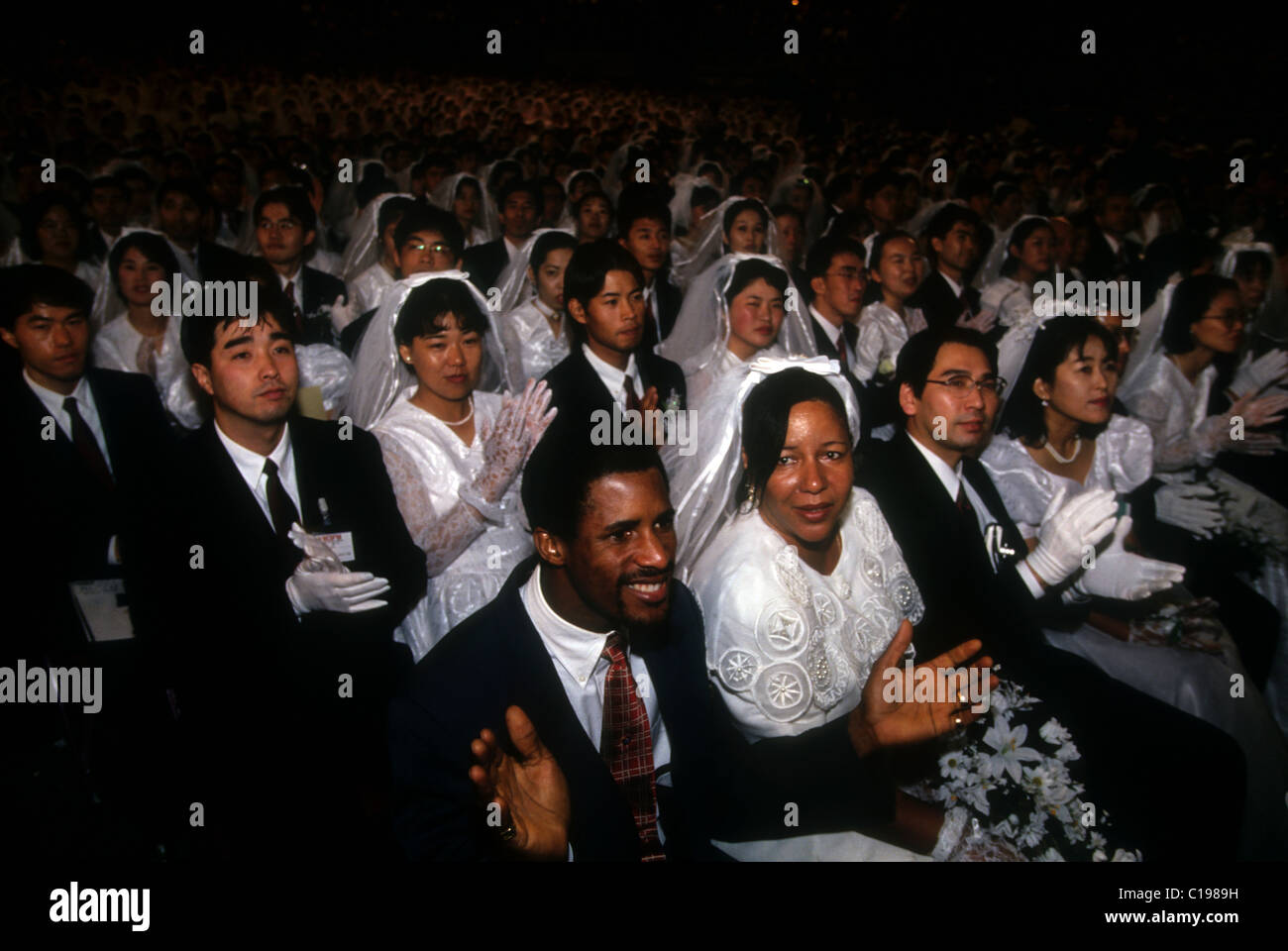 Rev. Sun Myung Moon Blessing 98 mass wedding in Madison Square Garden in New York on June 13, 1998. (© Richard B. Levine) Stock Photo