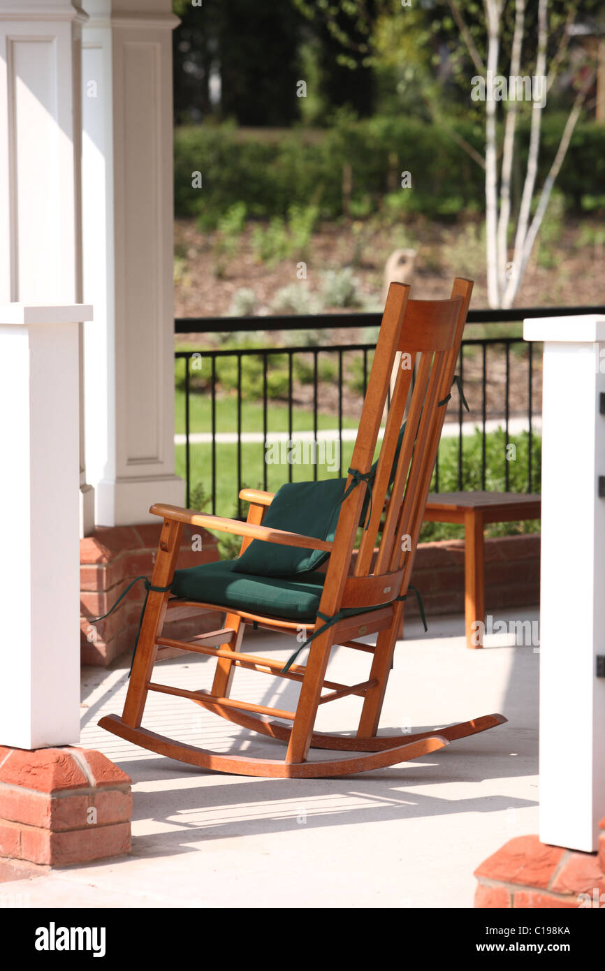 Wooden rocking chair on veranda Stock Photo
