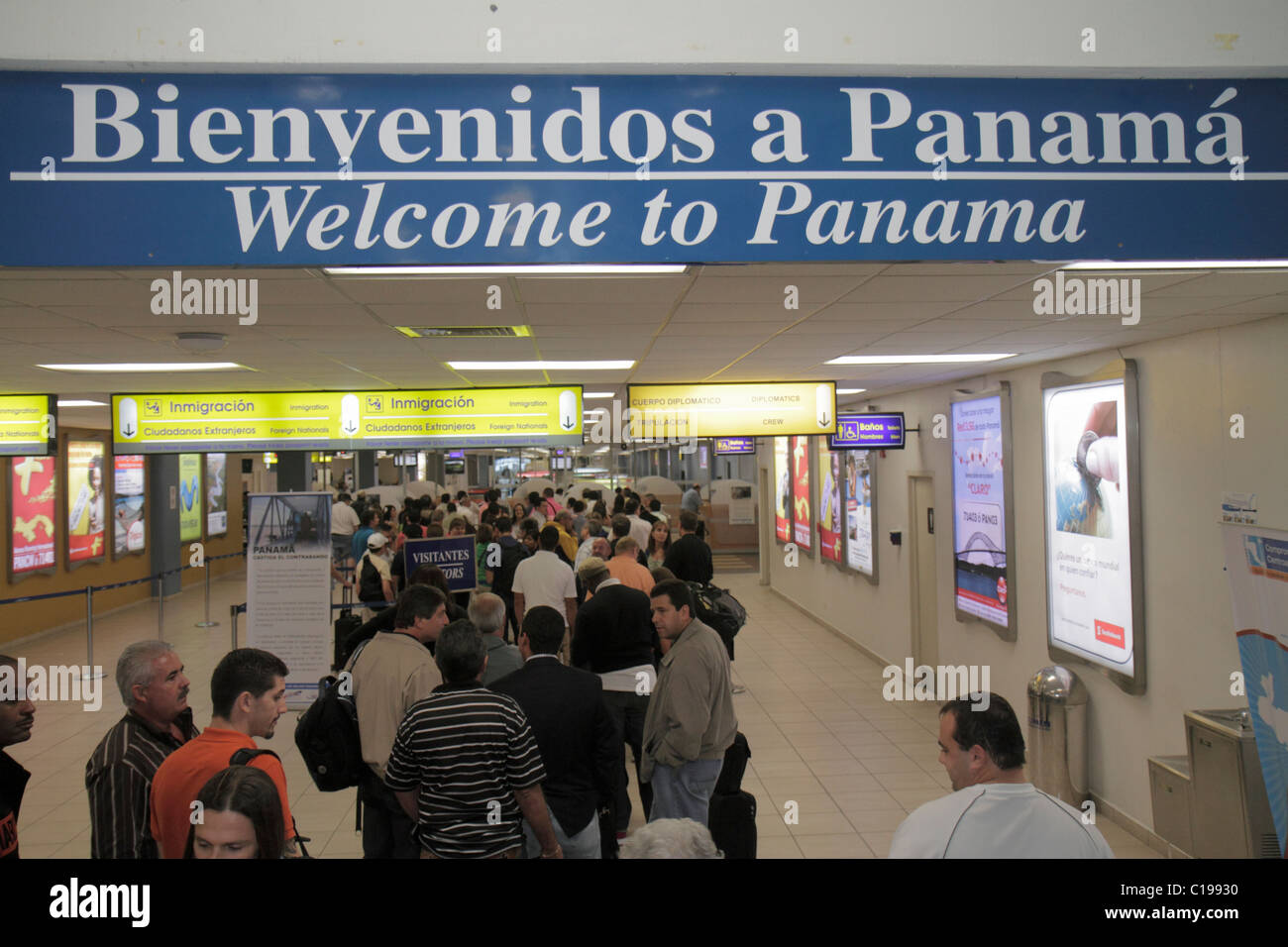 Panama,Latin,Central America,Panama City,Aeropuerto Tocumen,airport,PTY,aviation,terminal,sign,man men male,woman female women,international passenger Stock Photo