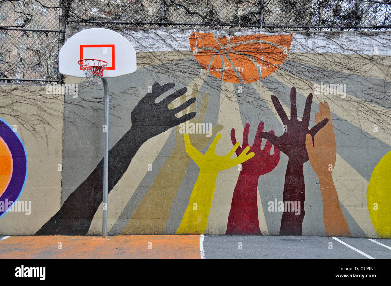 Mural encouraging ball games, School in Harlem, Manhattan, New York City, USA, North America Stock Photo
