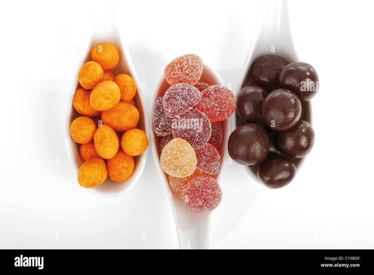 Roasted peanuts with a crispy crust, chocolatecoated hazelnuts and