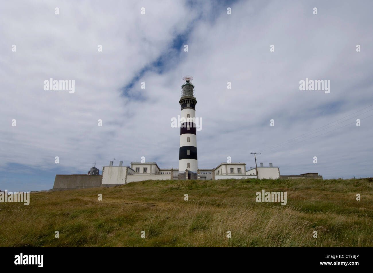 Lighthouse on the western coast, Ile d'Ouessant Island, Bretagne, France, Europe Stock Photo