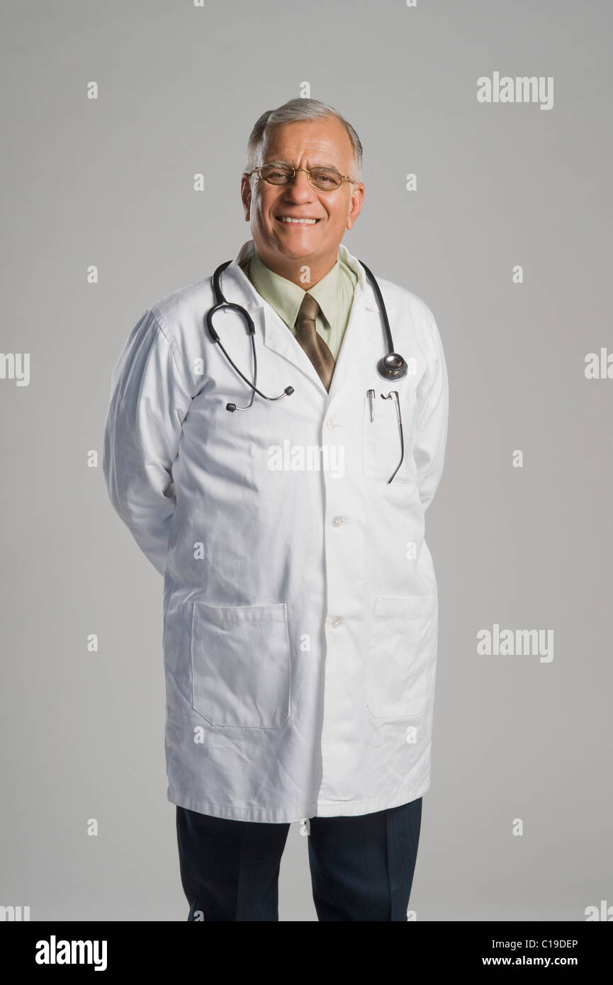 Portrait of a doctor smiling Stock Photo - Alamy