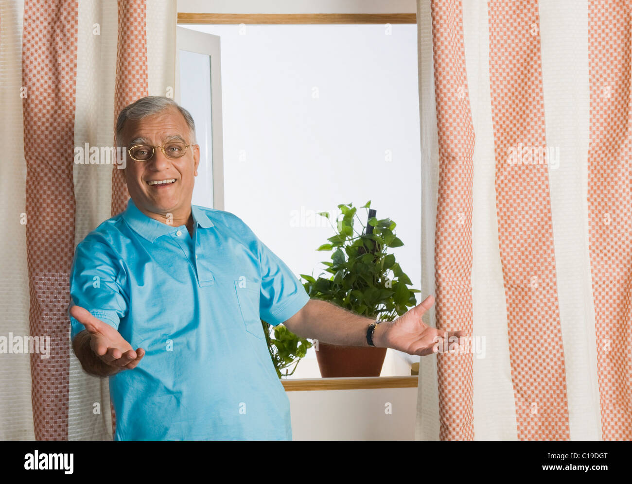 Portrait of a man smiling at home Stock Photo
