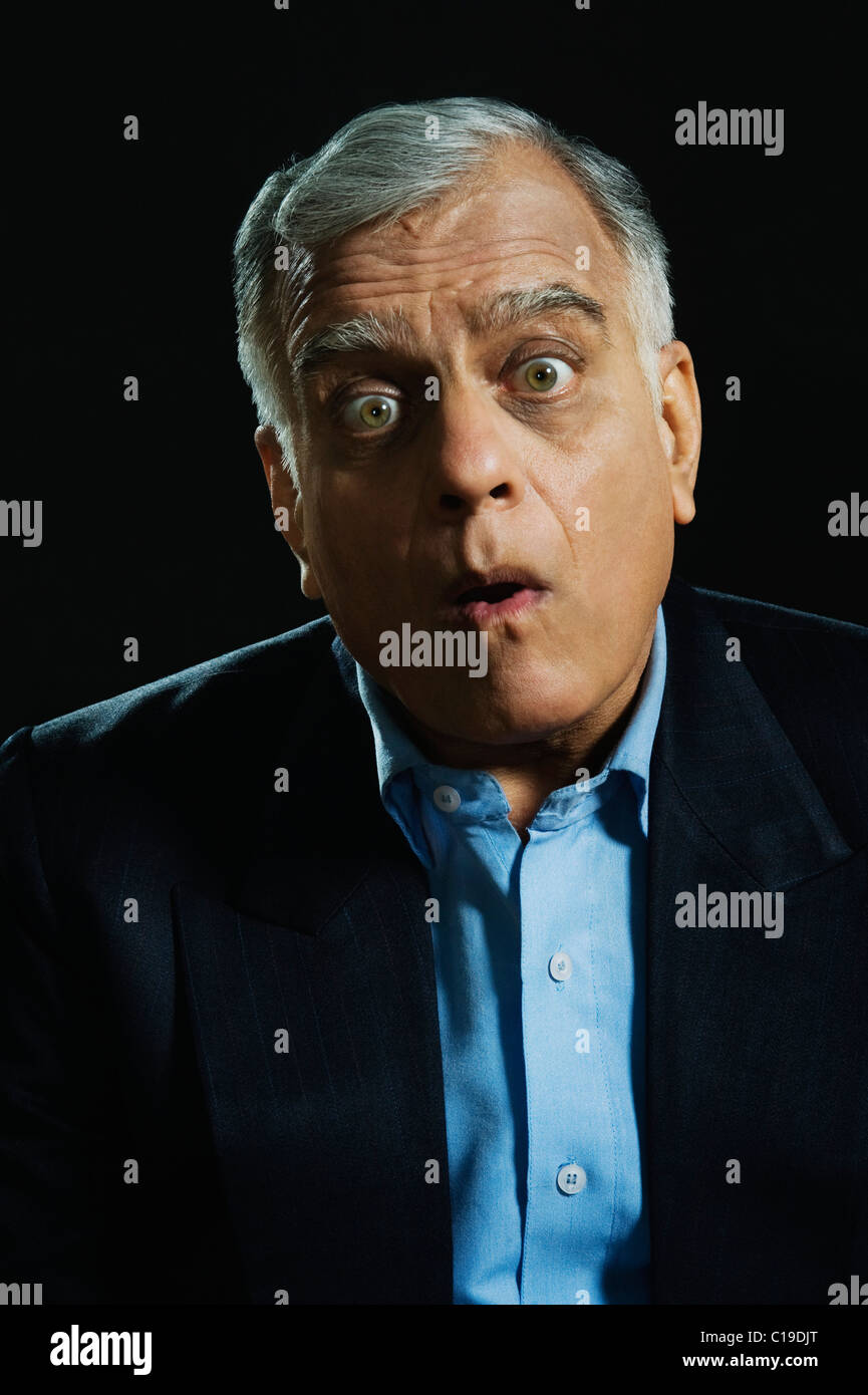 Portrait of a businessman looking shocked Stock Photo