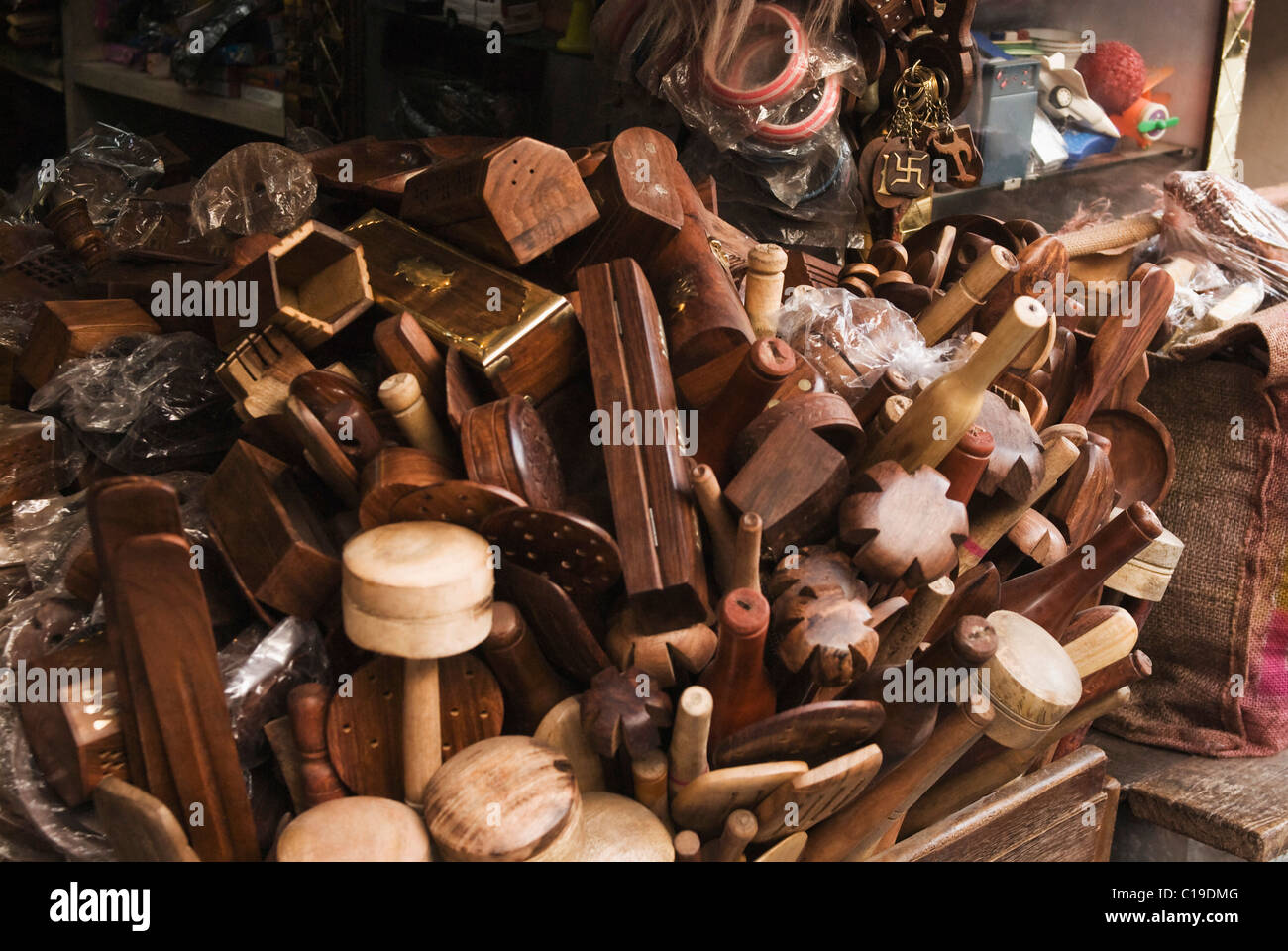 Wooden kitchen utensils at a street market, Haridwar, Uttarakhand