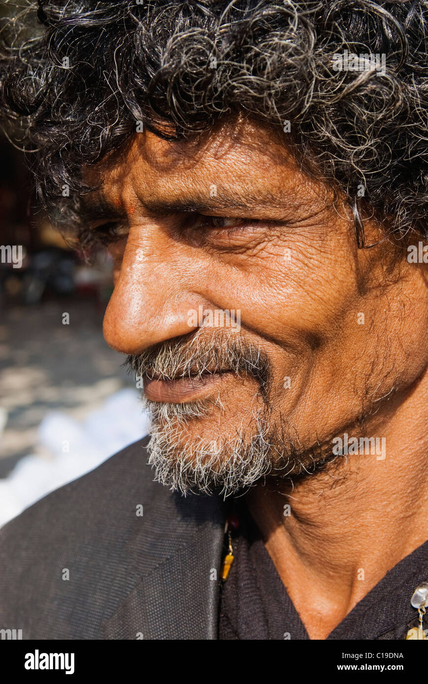 Close-up of a man smiling, Haridwar, Uttarakhand, India Stock Photo