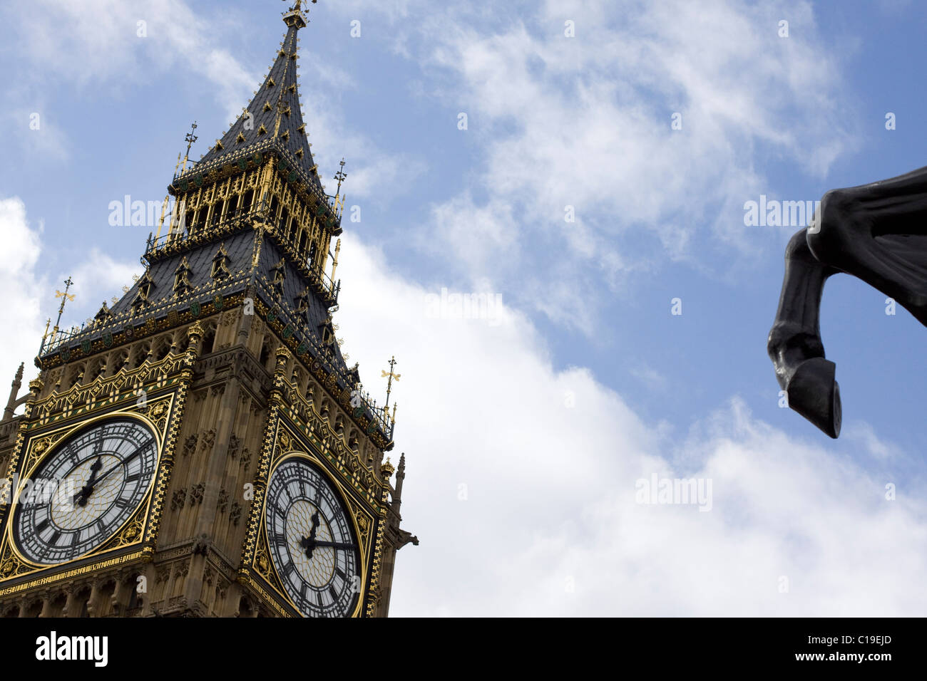 Abstract view of Big Ben with A bronze horse in front of it Stock Photo