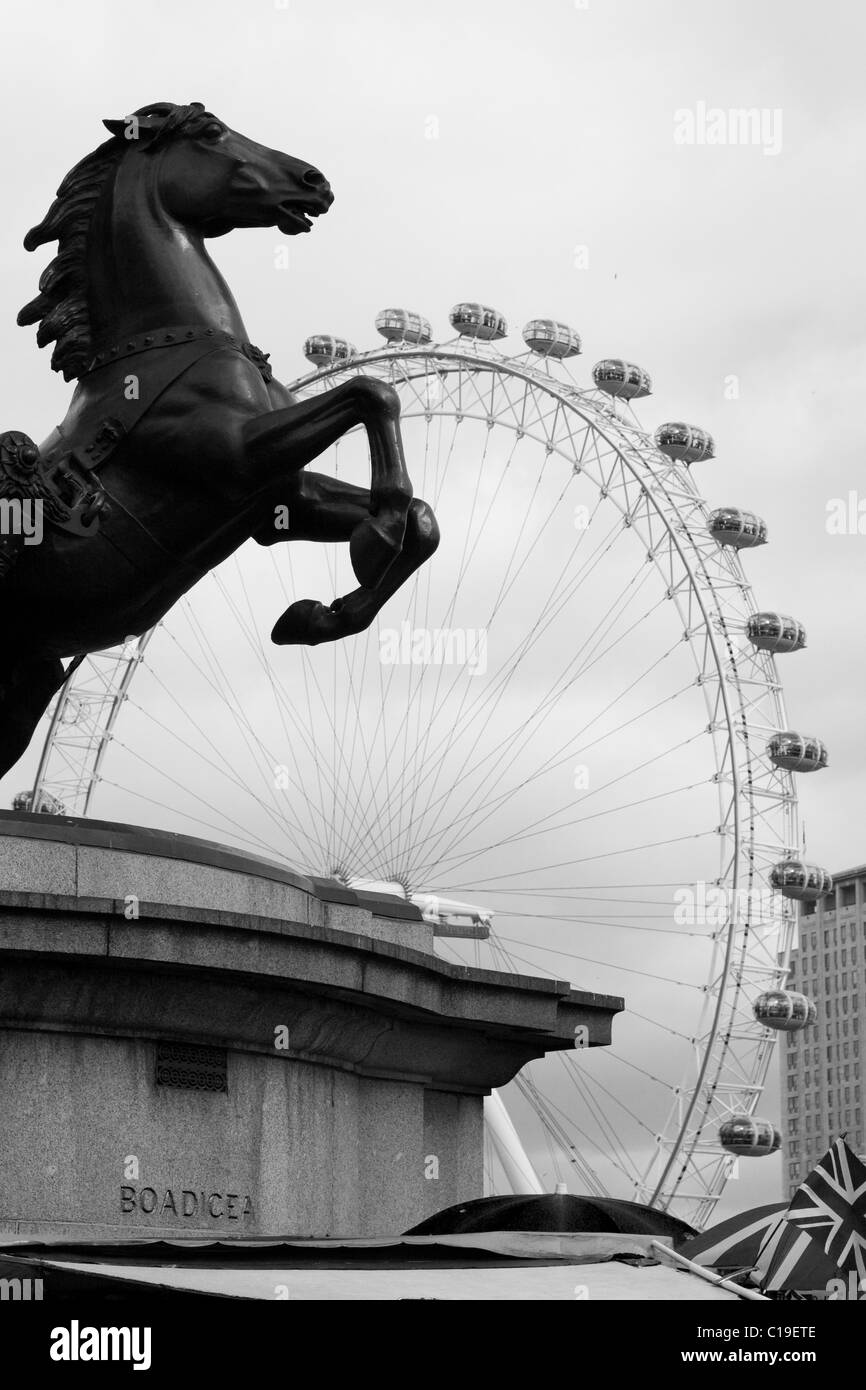 A Bronze Horse rearing Over The London eye in the city of London England Black and White Stock Photo