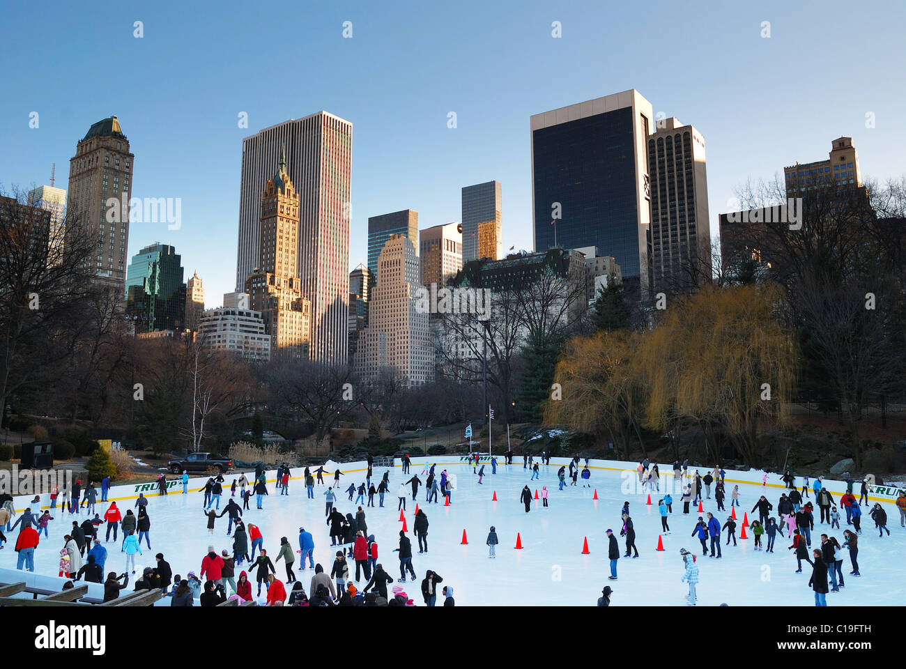 Central Park Ice Skate Rink, New York City Manhattan with skyscrapers
