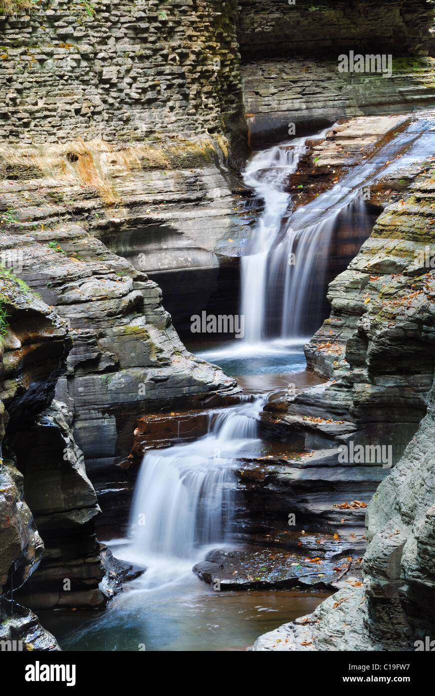 waterfall details in woods with rocks and stream in Watkins Glen state park in New York State Stock Photo