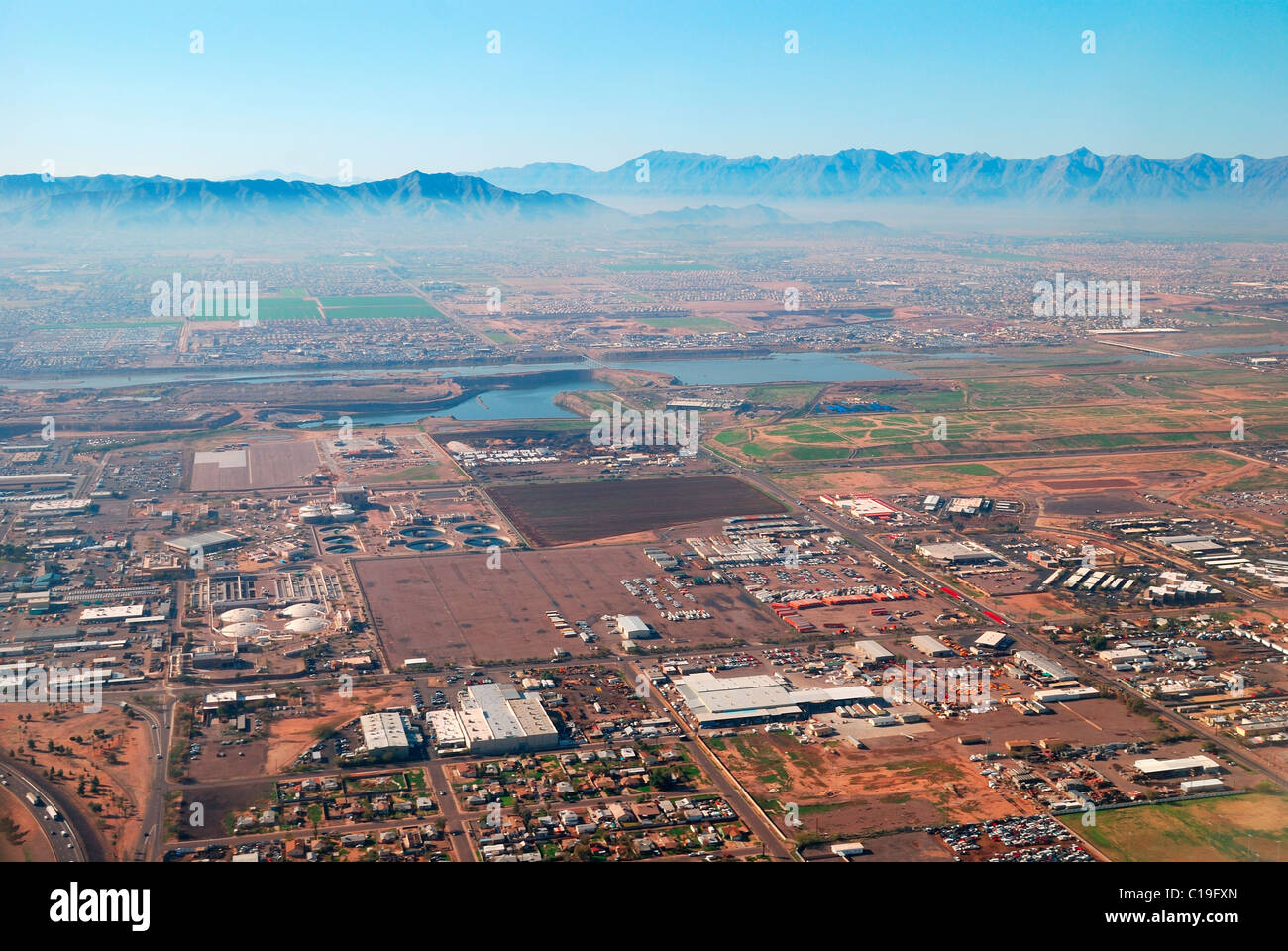 Aerial view of Phoenix city with buildings and CamelBack mountain in Arizona. Stock Photo