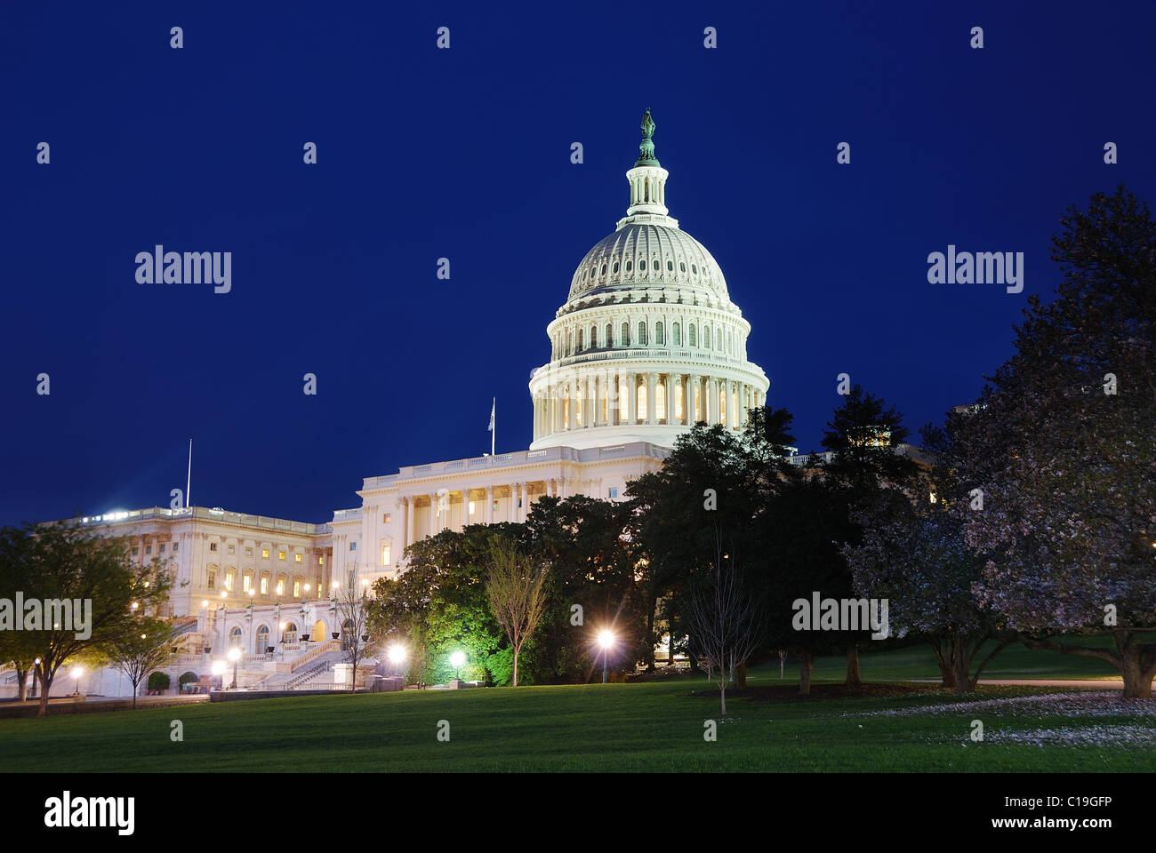 Capitol Hill Building at dusk with light and blue sky, Washington DC. Stock Photo