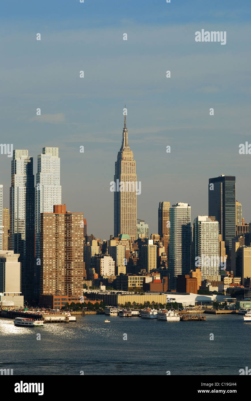 Empire State Building with New York City Manhattan skyline at dusk with ...