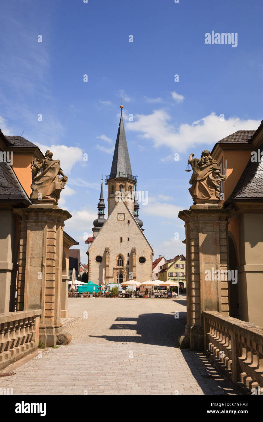 Weikersheim, Baden-Wurttemberg, Germany. View from gatehouse of Weikersheim Castle to St George's Church in medieval town square Stock Photo