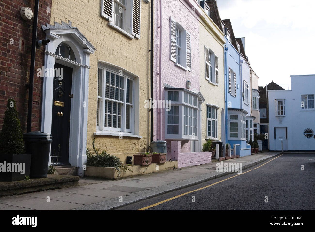 A row of brightly painted houses in Chelsea, London, UK Stock Photo