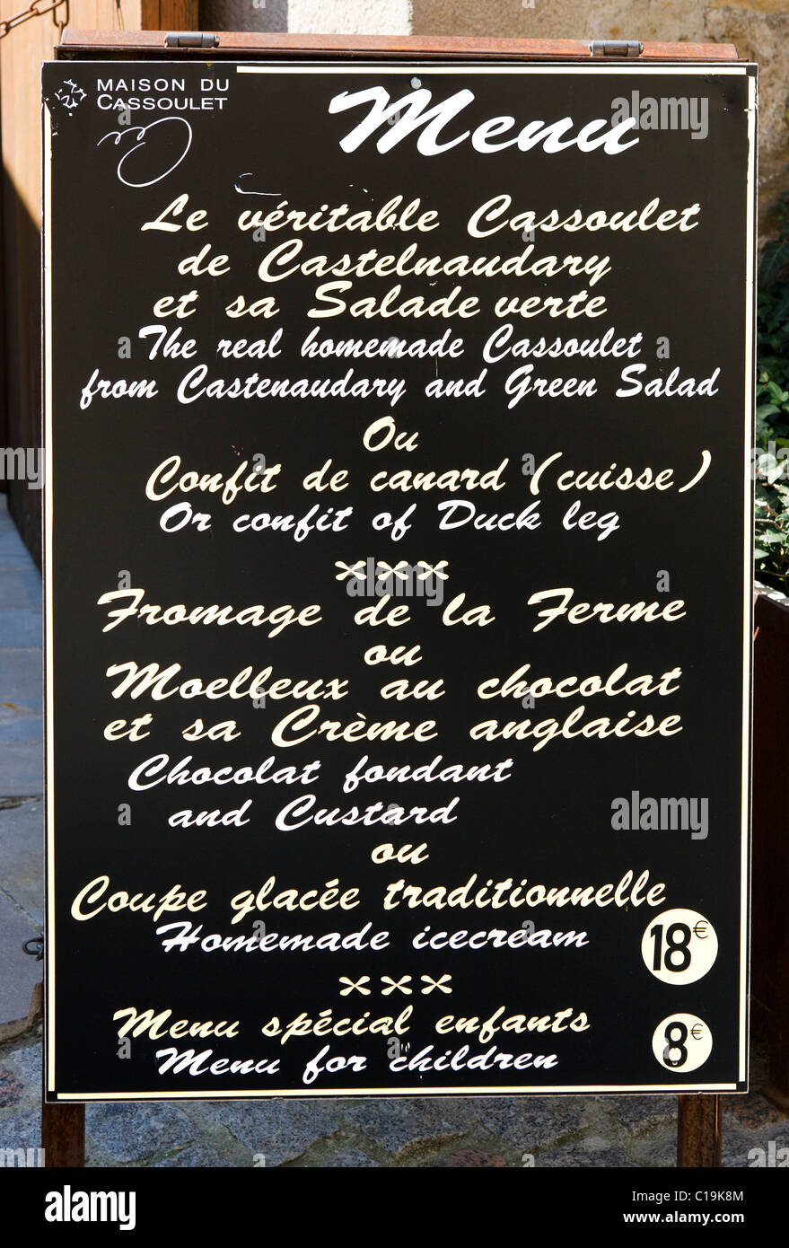 Menu board for Cassoulets outside a restaurant in the medieval walled city (Cite) of Carcassonne, Languedoc, France Stock Photo