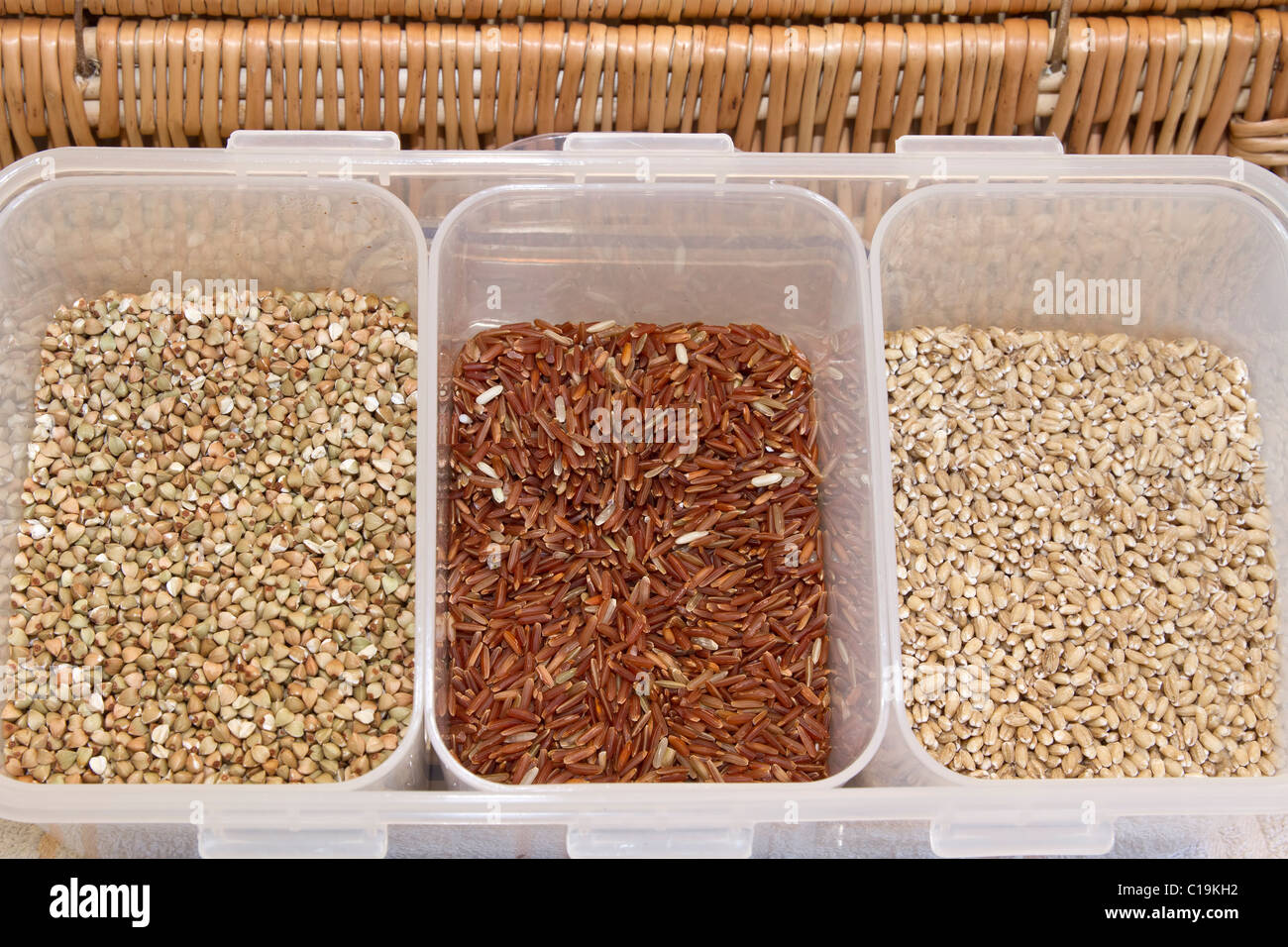Organic Grains Display with Brown Rice Barley and Wheat Stock Photo