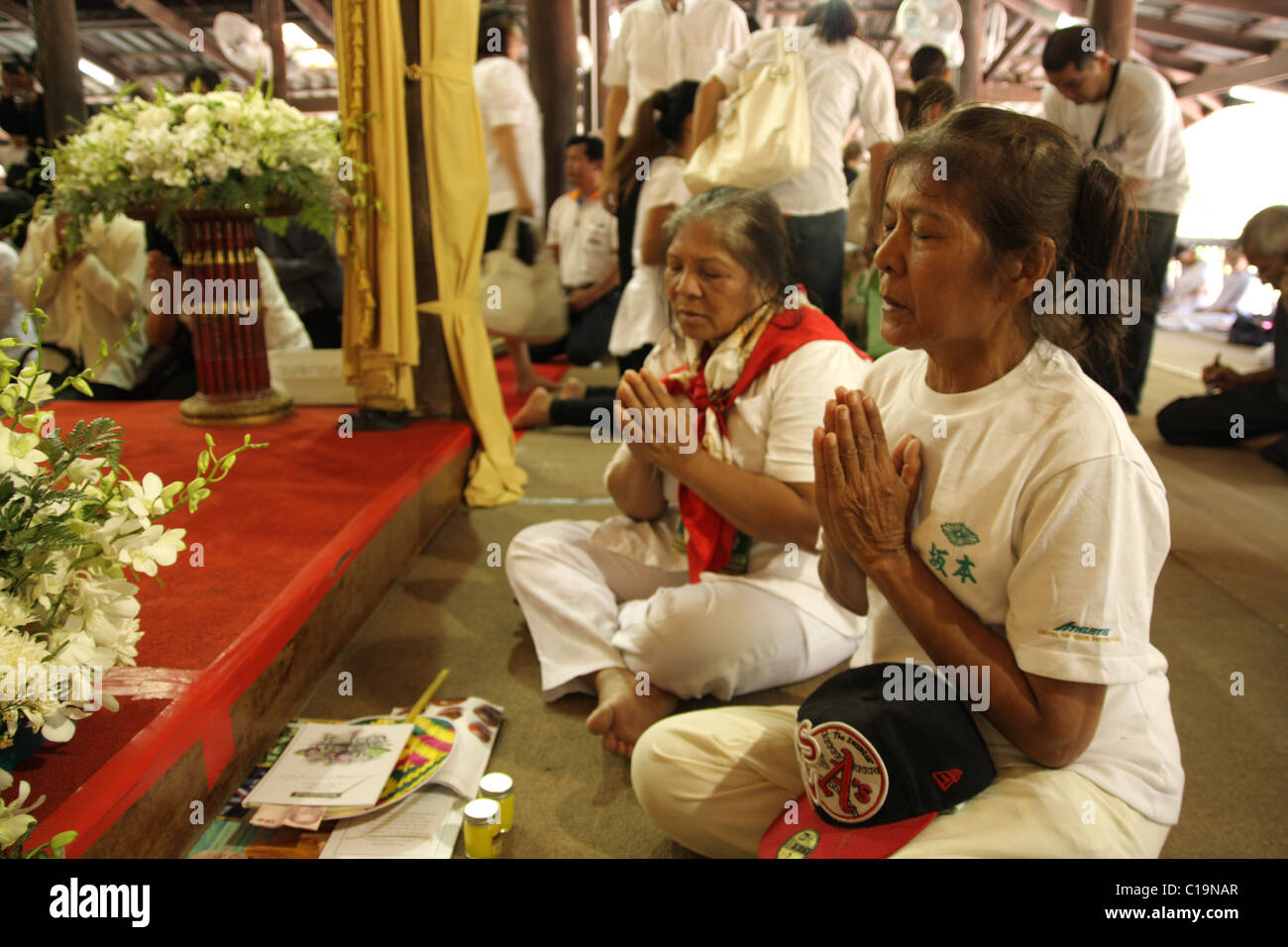 Thai people preying in the cremation of Luang Ta Maha Bua Yannasampanno