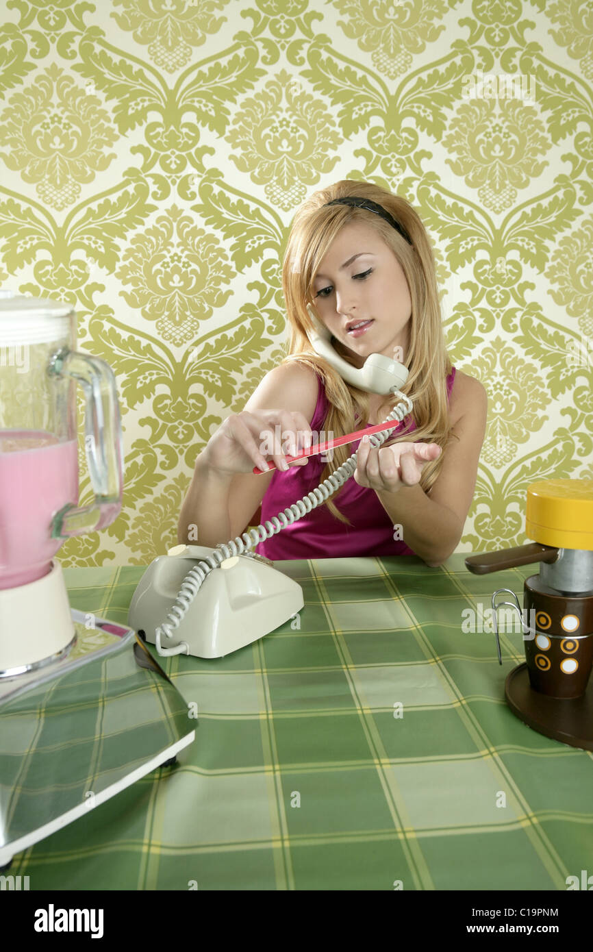 Housewife retro vintage talking phone kitchen nail file Stock Photo - Alamy