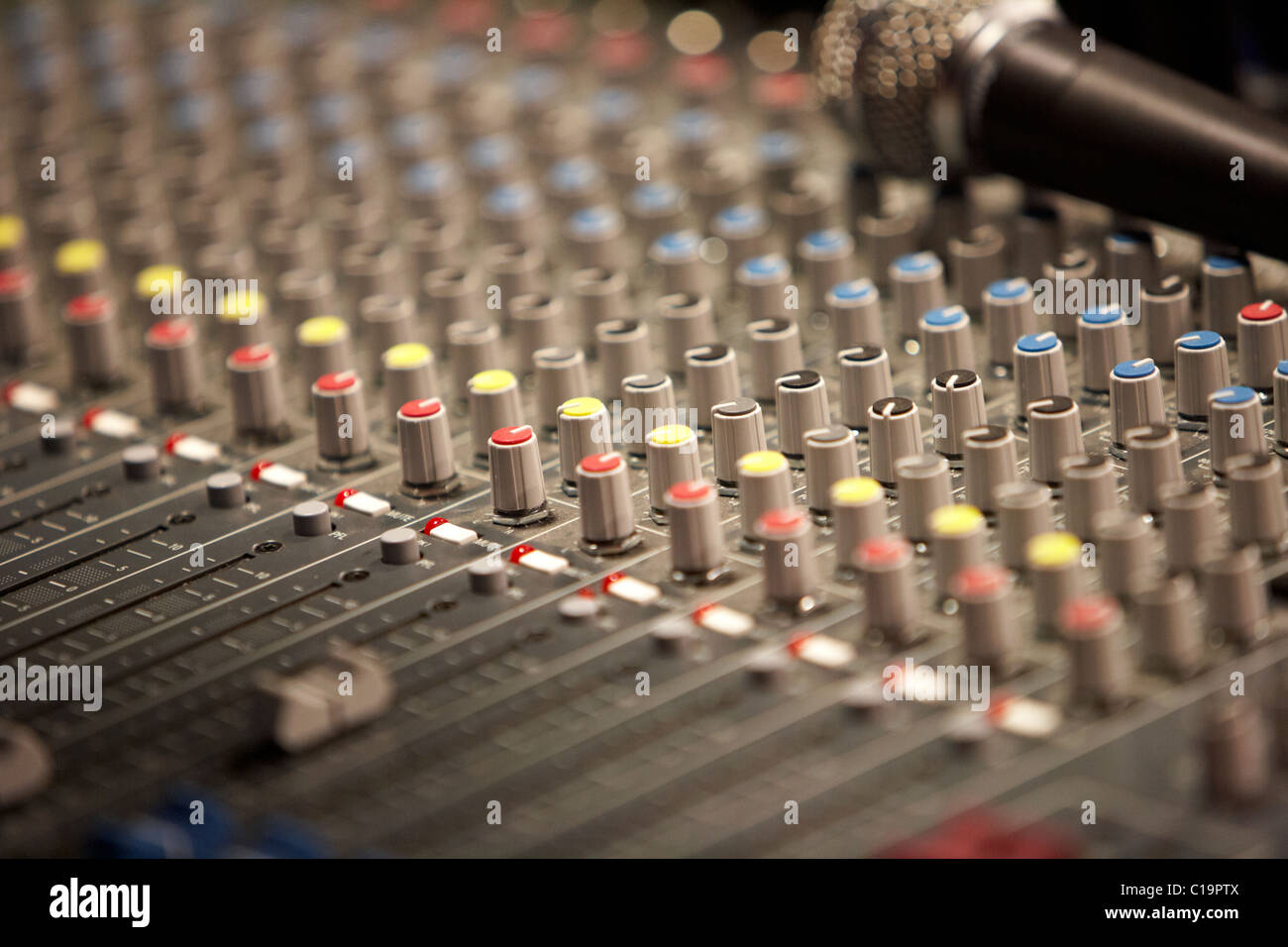 pan pots on an audio mixing desk in a theatre concert hall Stock Photo