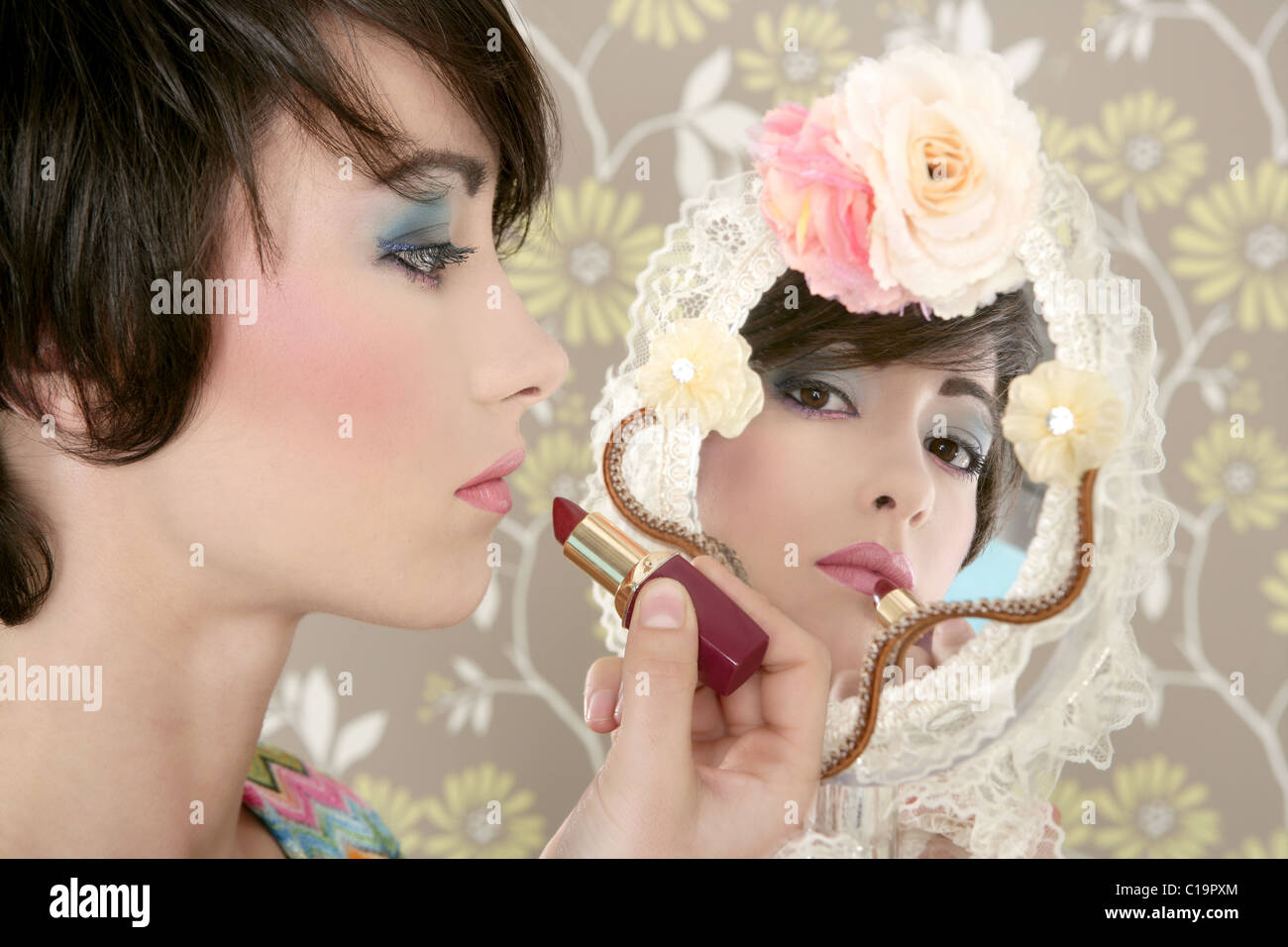 retro woman mirror lipstick makeup tacky fashion vintage wallpaper Stock Photo