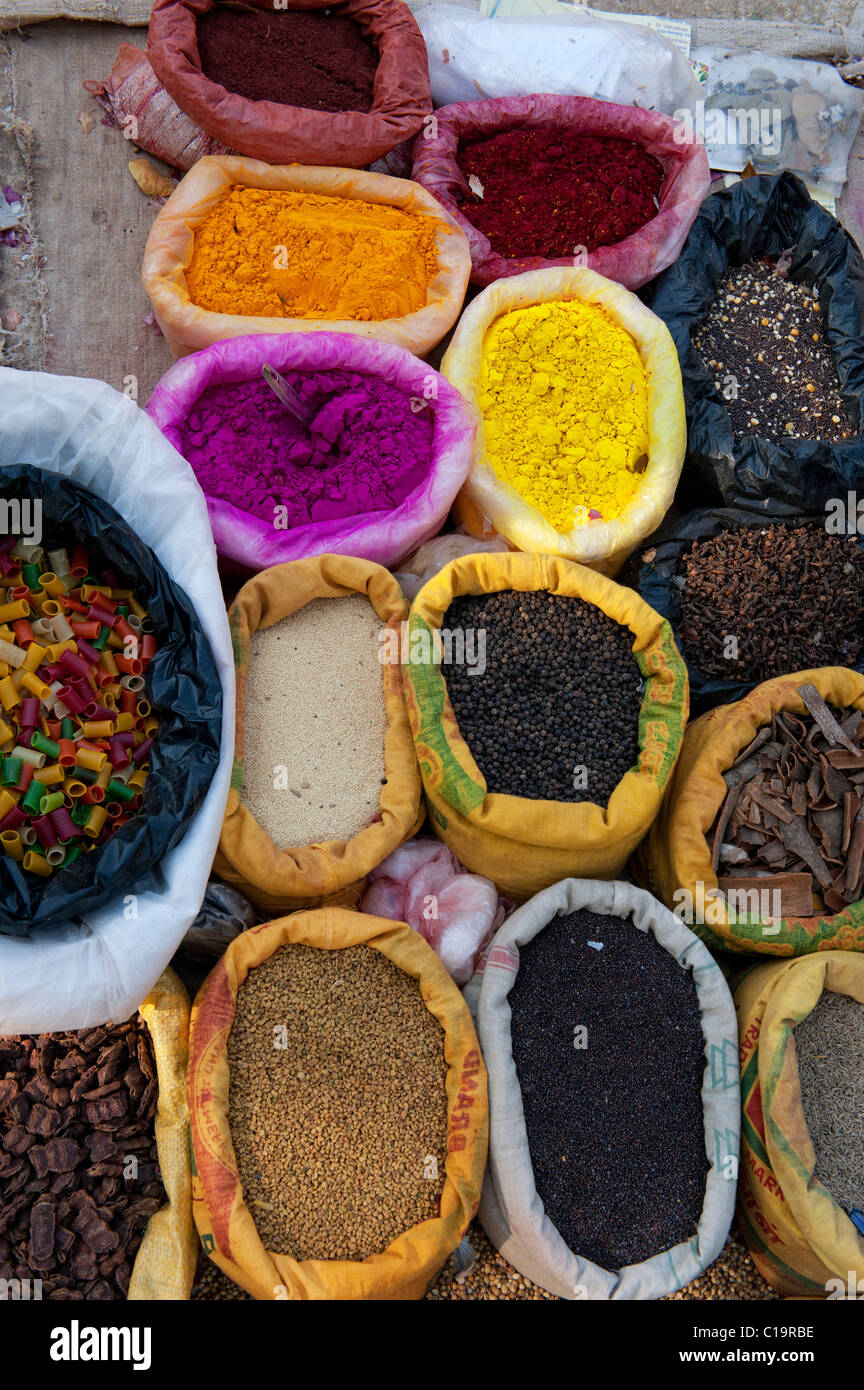 Indian street market with sacks of Indian spices and dried produce and coloured powder. Andhra Pradesh, India Stock Photo