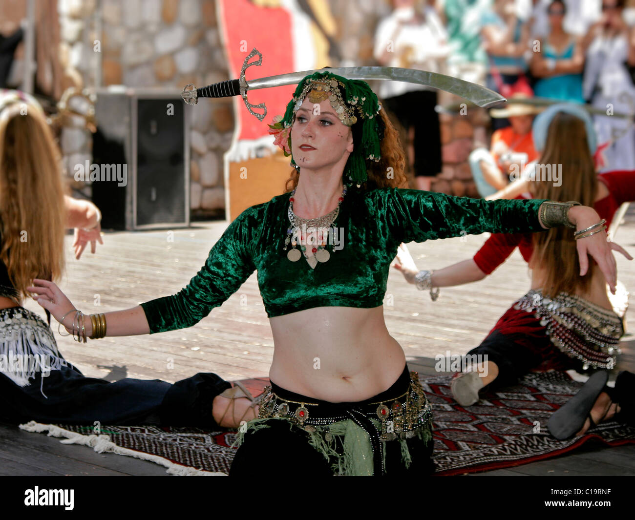 Moroccan Belly dancers performing a sword dance Stock Photo