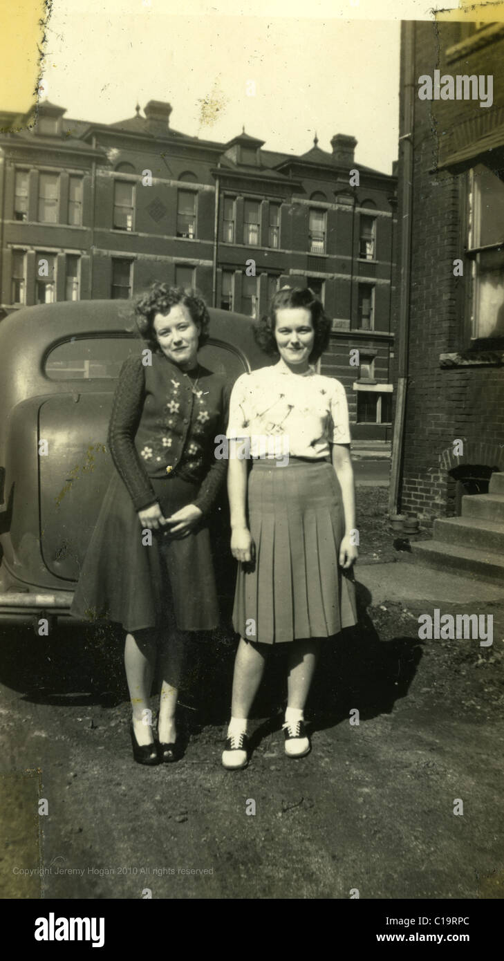portrait of two sisters in the mid 1940s WWII era Indiana Stock Photo