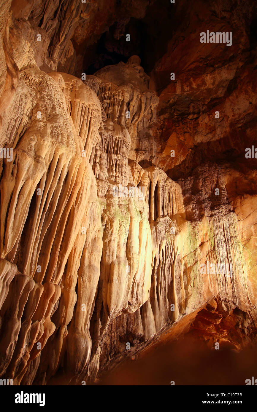 cave stalactites underground cavern magic light in Pyrenees Spain Stock Photo