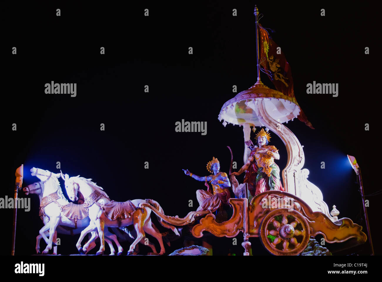 Sculptures of a chariot of lord Krishna and Arjuna at the entrance of Ganga ghat, Muni Ki Reti, Rishikesh, Uttarakhand, India Stock Photo